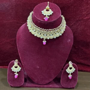 Gold plated polki Kundan necklace with mang tikka and earrings